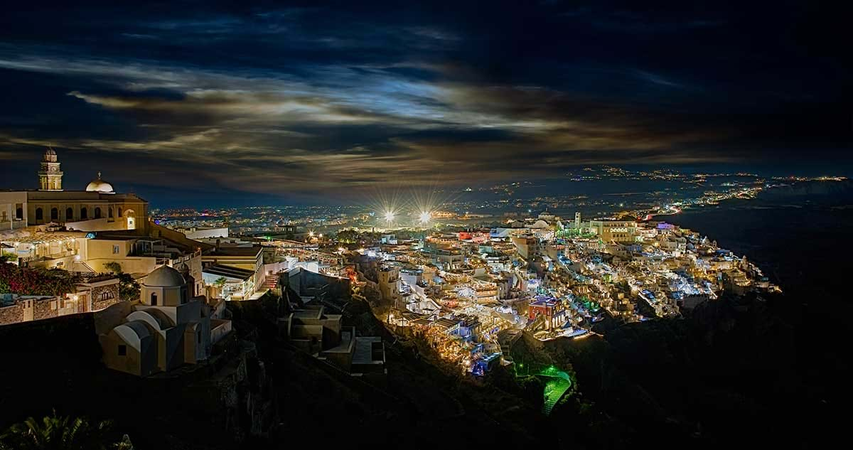 Greek city lit up at night