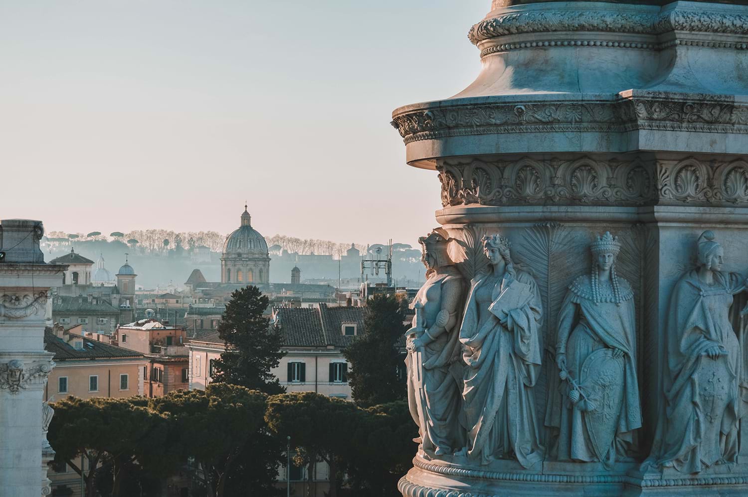 Statues on side of building in Rome