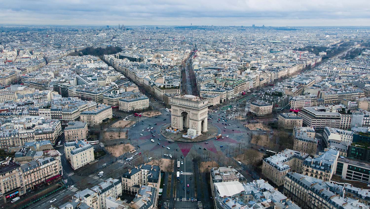 Above paris and the Arc de Triomphe