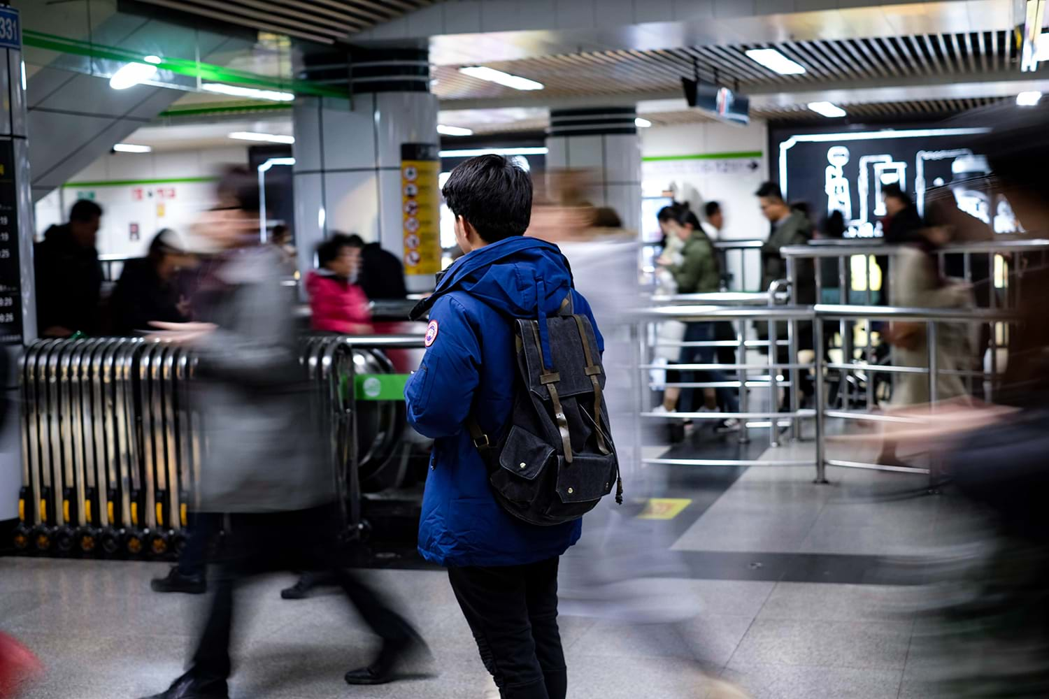 Blurred fast moving crowds in airport