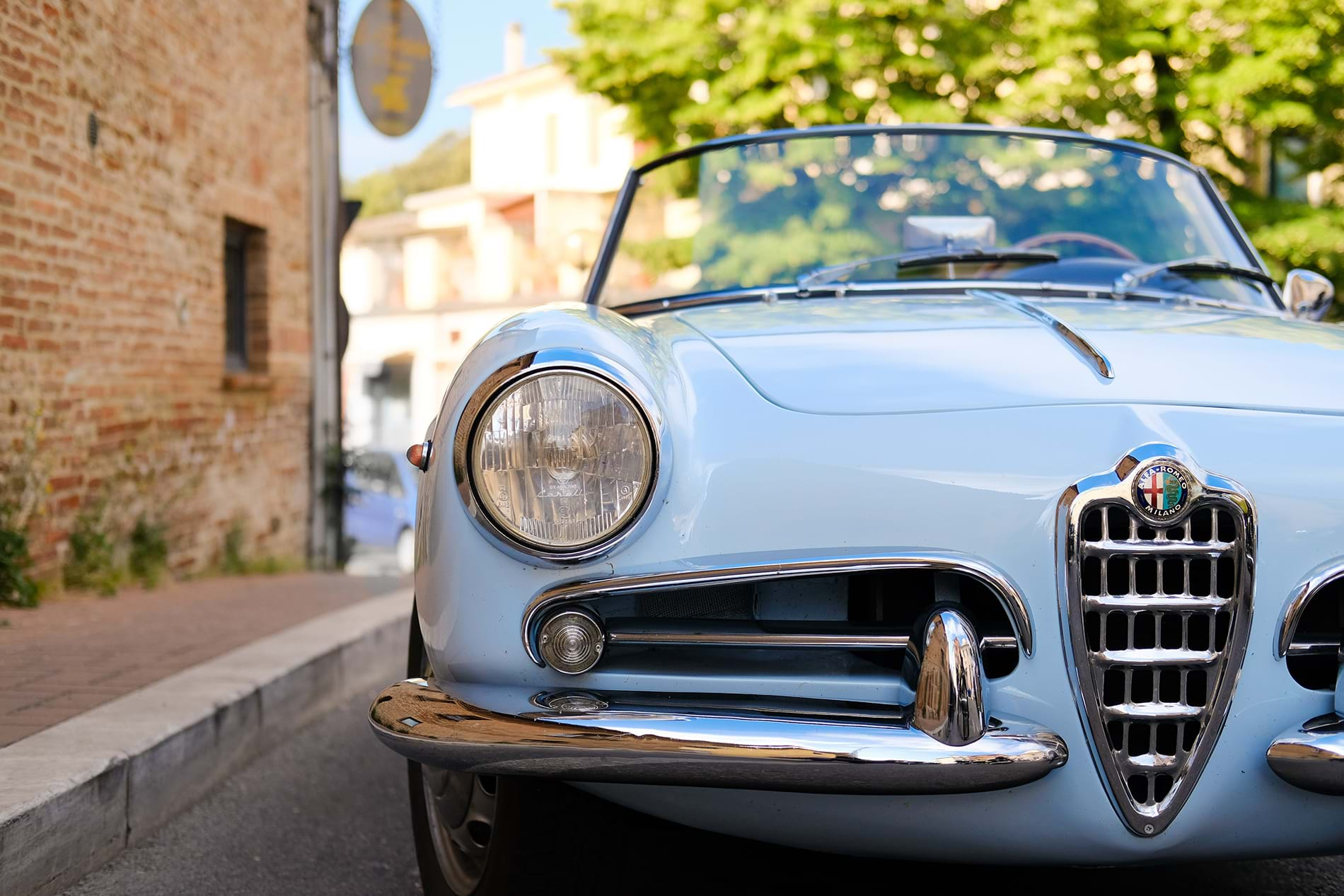 Front of vintage car parked on street