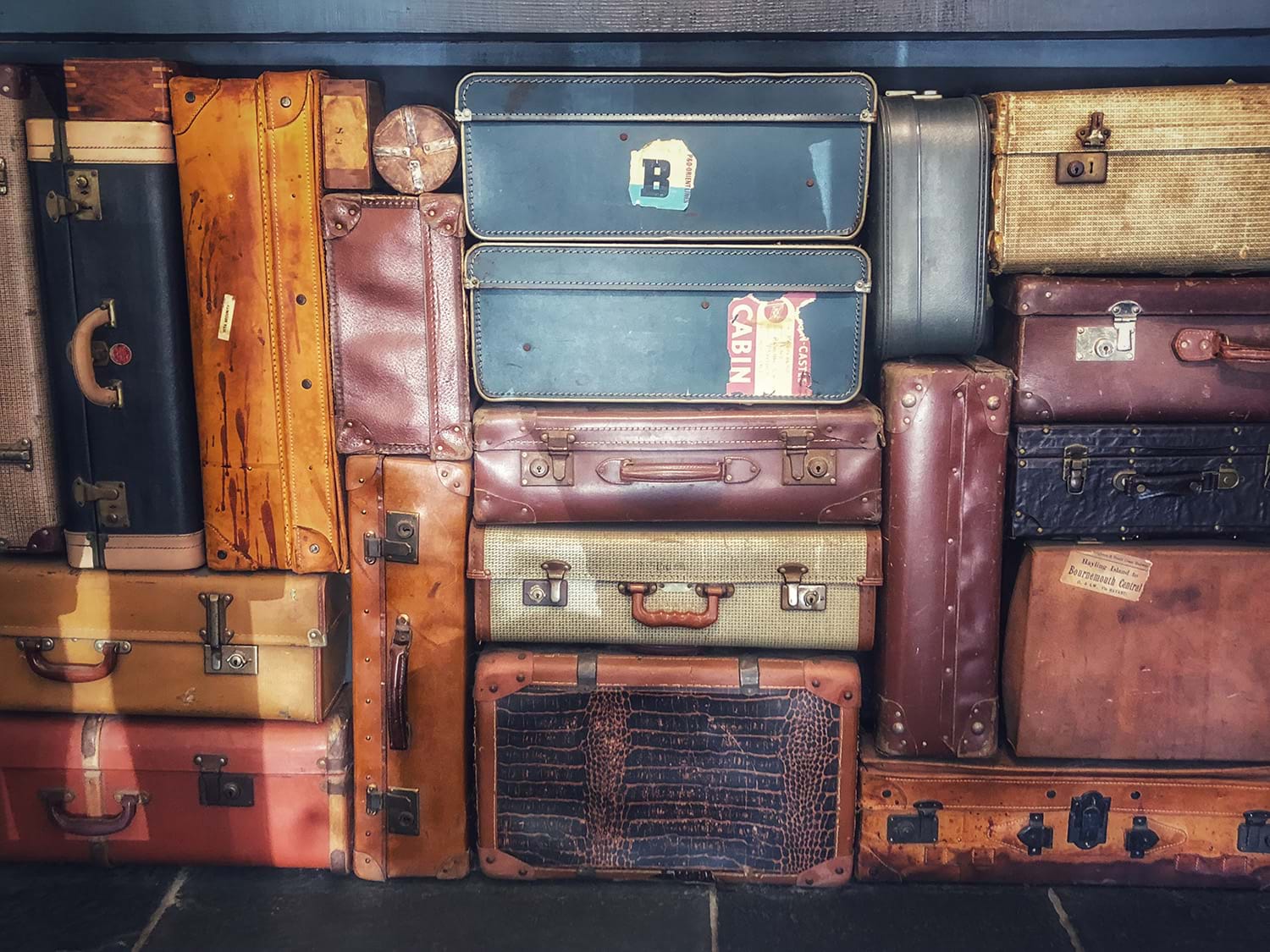 Stack of leather suitcases