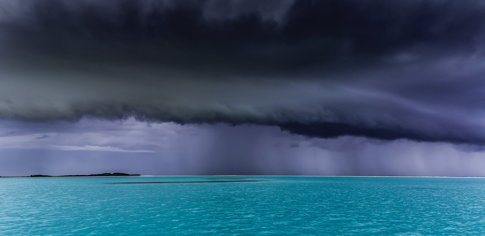 Dark storm clouds over ocean