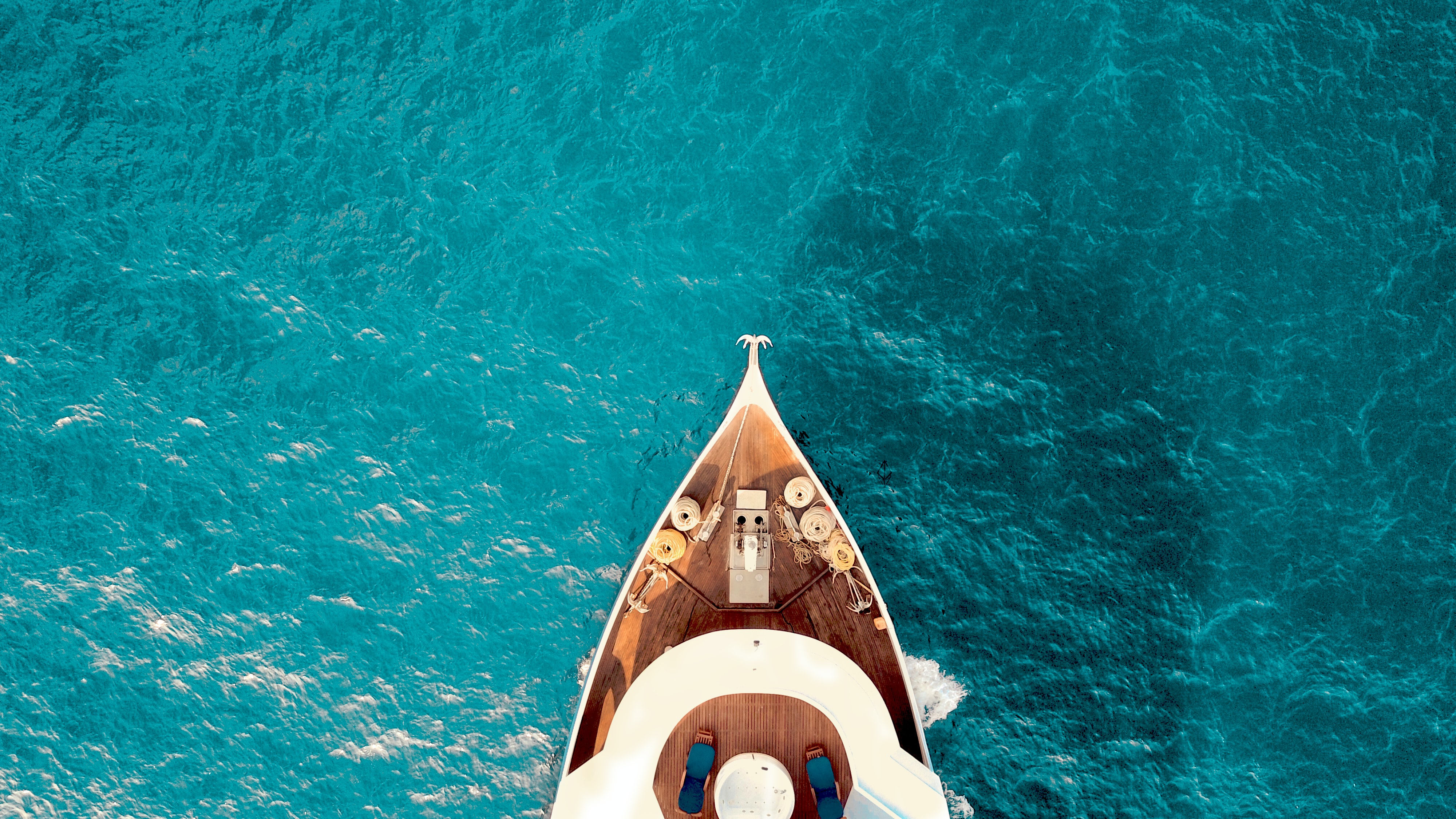 Bow of luxury boat on water