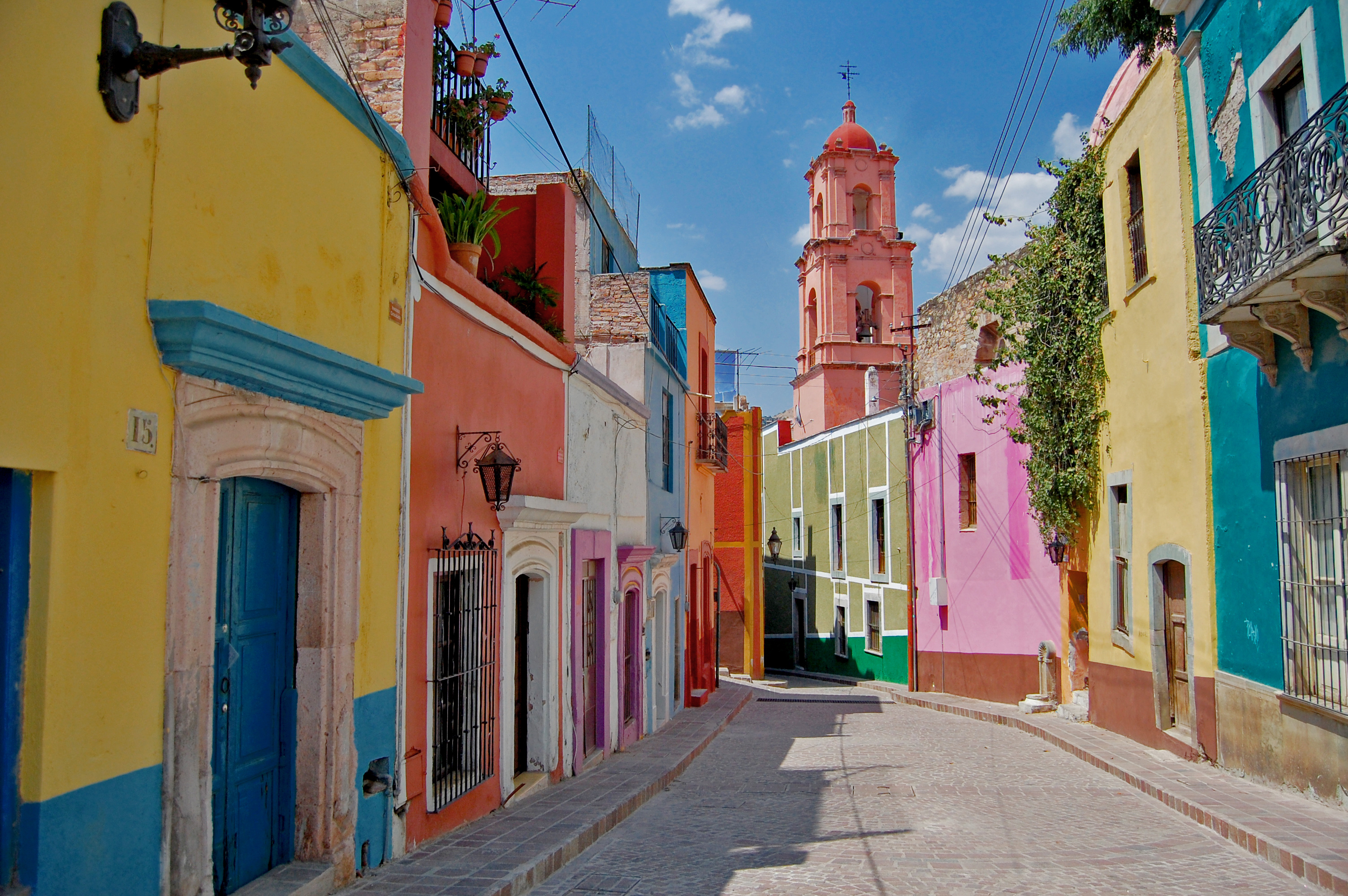 narrow street with colorful buildings