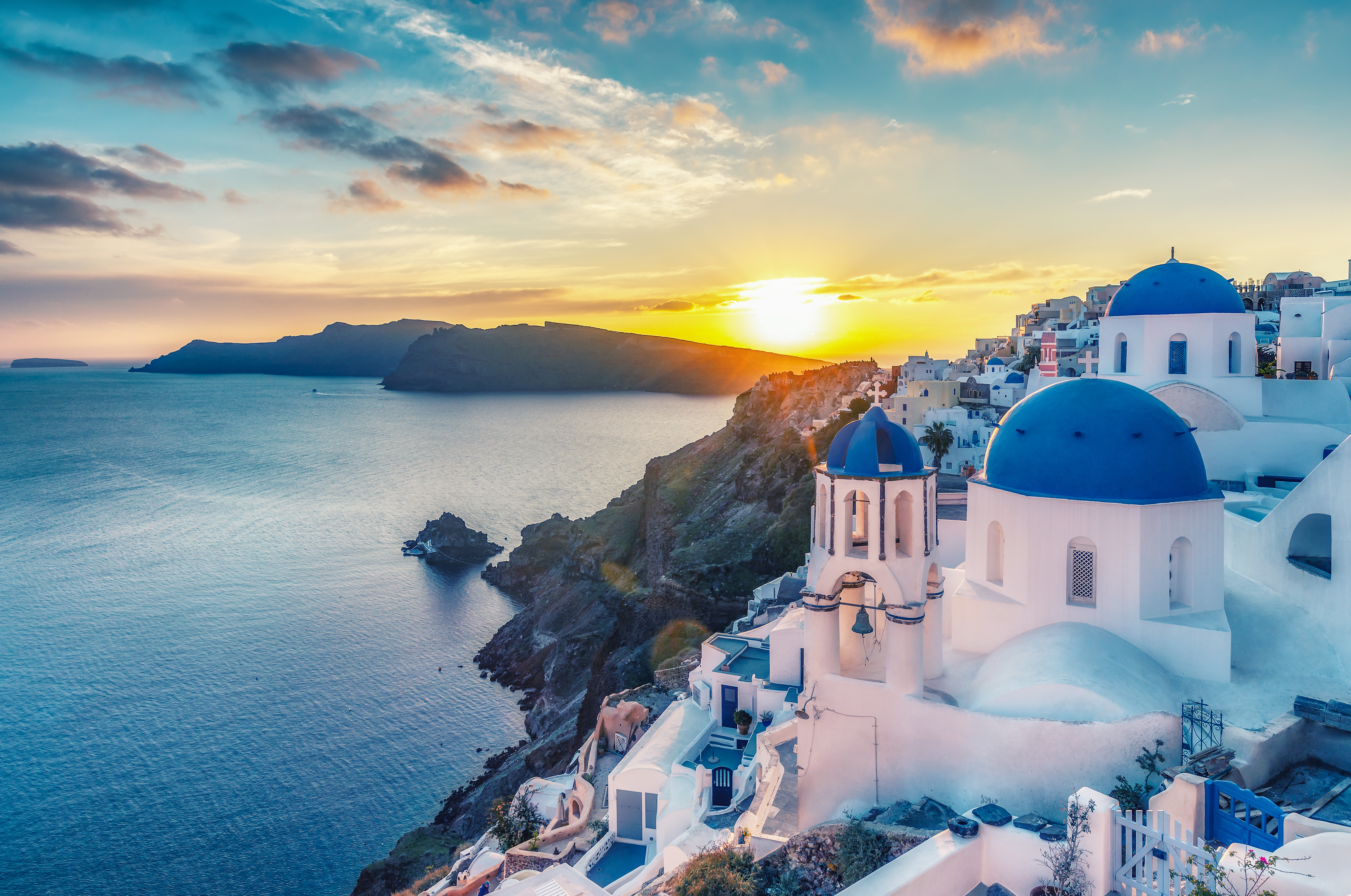 churches in oia village, greece