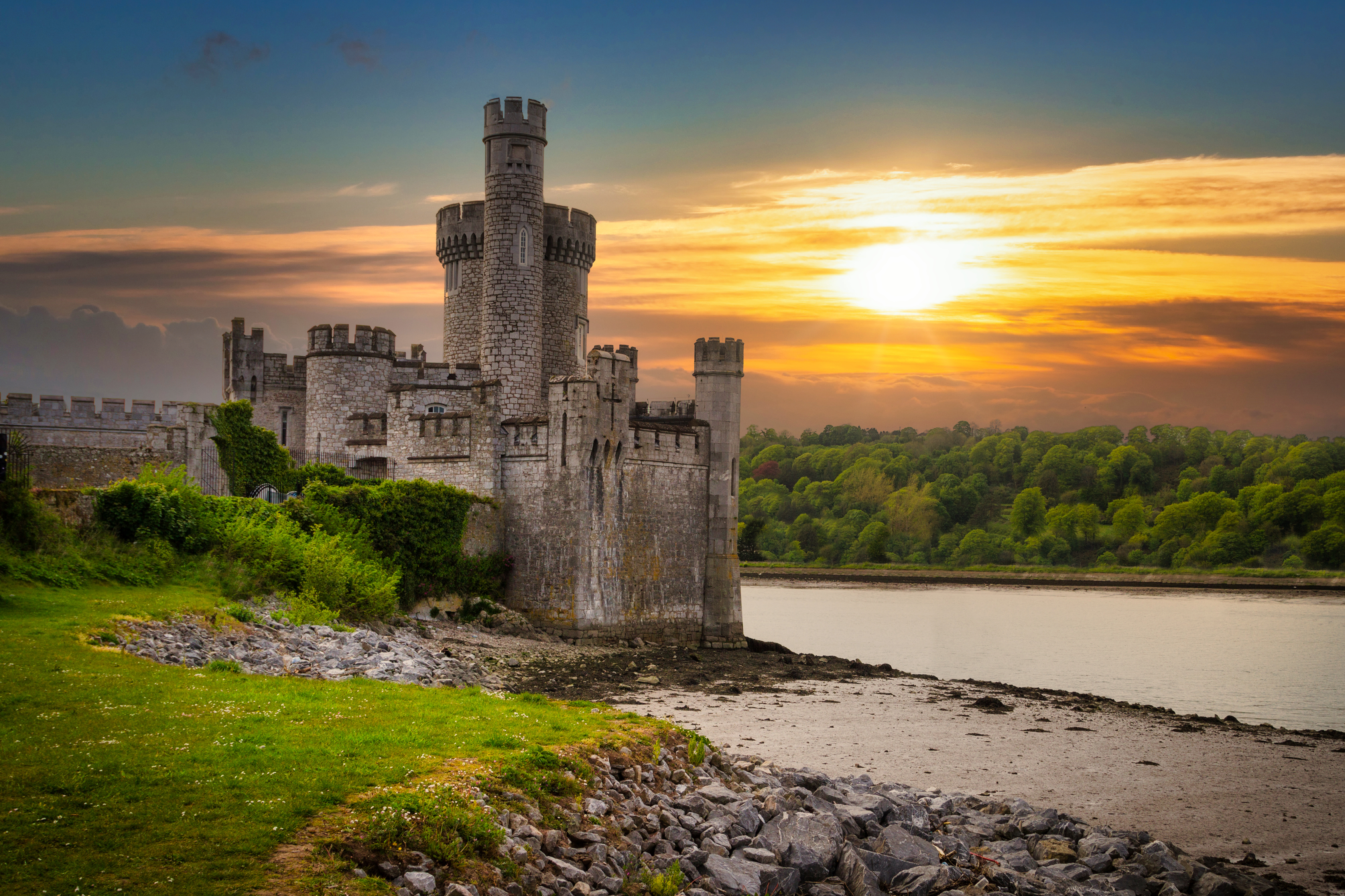 Castle next to river, Ireland