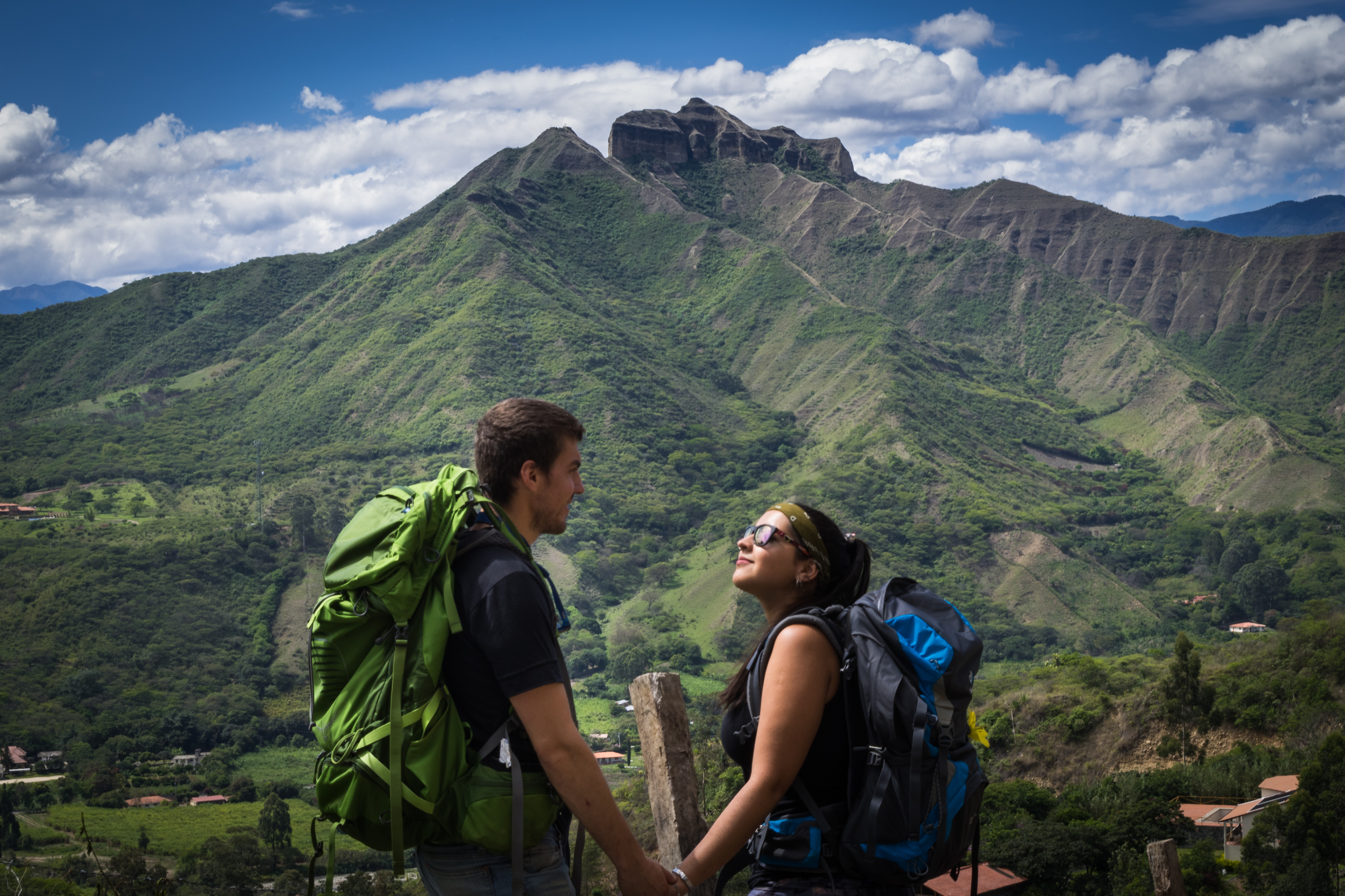Backpacker couple and natural Ecuador landscape
