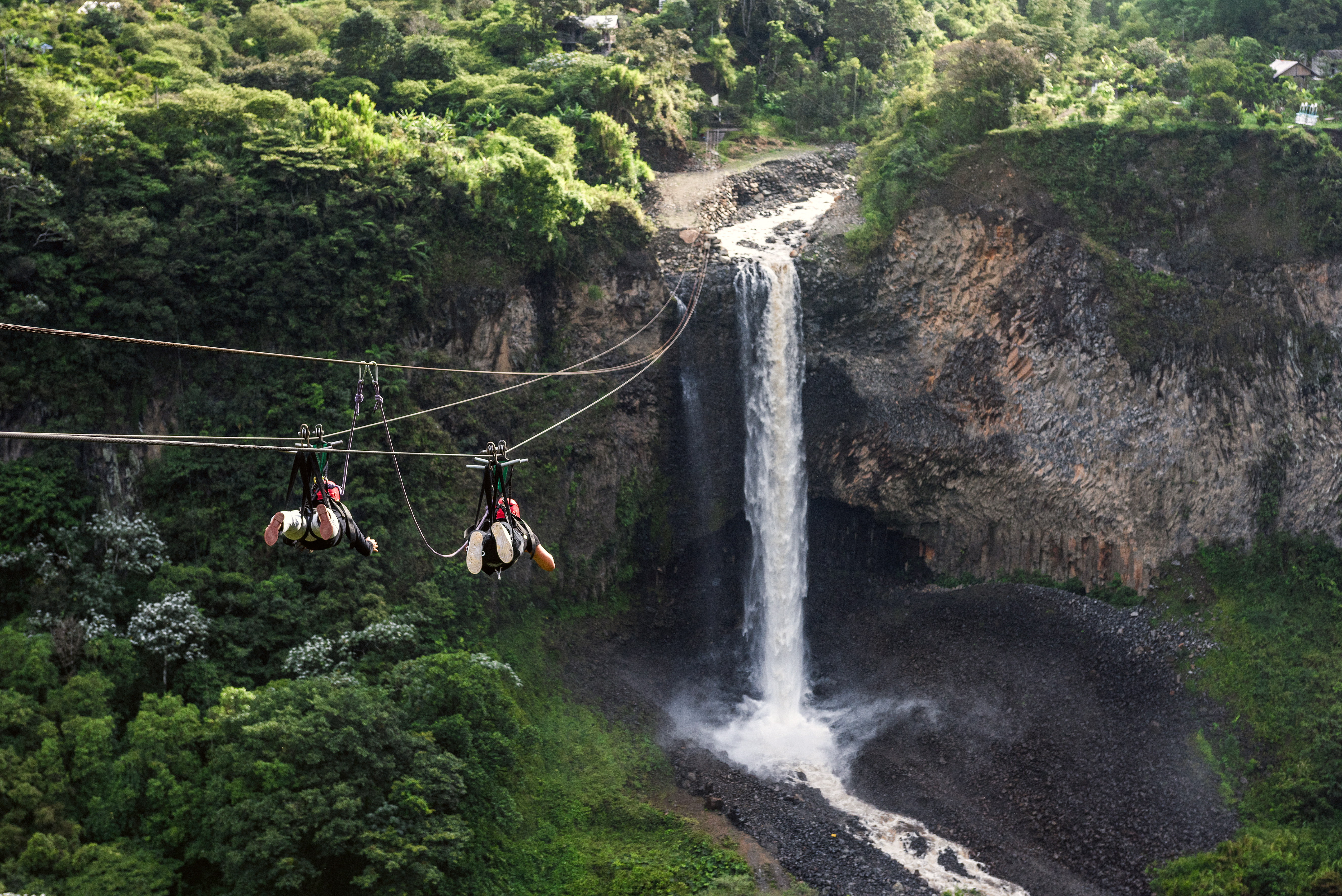 Zip line by waterfall in Banos, Ecuador