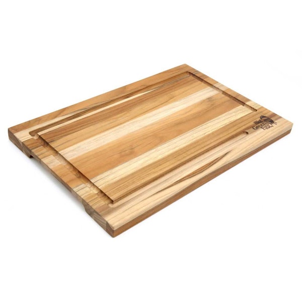 A beautiful hardwood cutting board. Made from a single sheet of sustainable teak. A unique gift for a Big Green Egg lover.