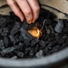 It's easy to light the EGG; just place a firestarter in the centre of your charcoals and wait!
