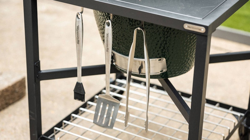 Large Big Green Egg in a Modular Nest Tool Hooks close up