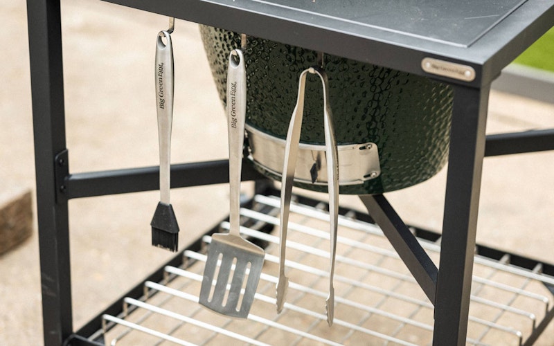 Large Big Green Egg in a Modular Nest Tool Hooks close up