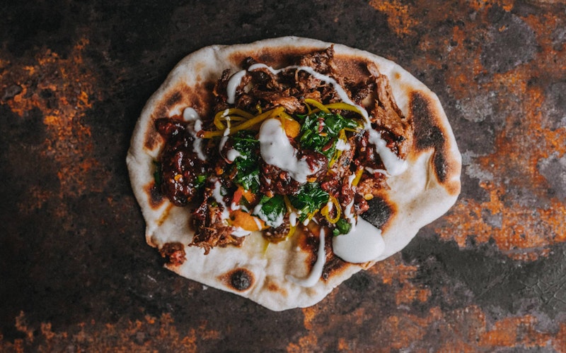 Tender and aromatic with a satisfying depth of flavour, this Smoked Beef Naan — provided by Tom Griffith of Flank fame — is so worth the effort.