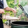 ConvEGGtor basket being put into a Large Big Green Egg