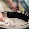 ConvEGGtor basket being put into a Large Big Green Egg