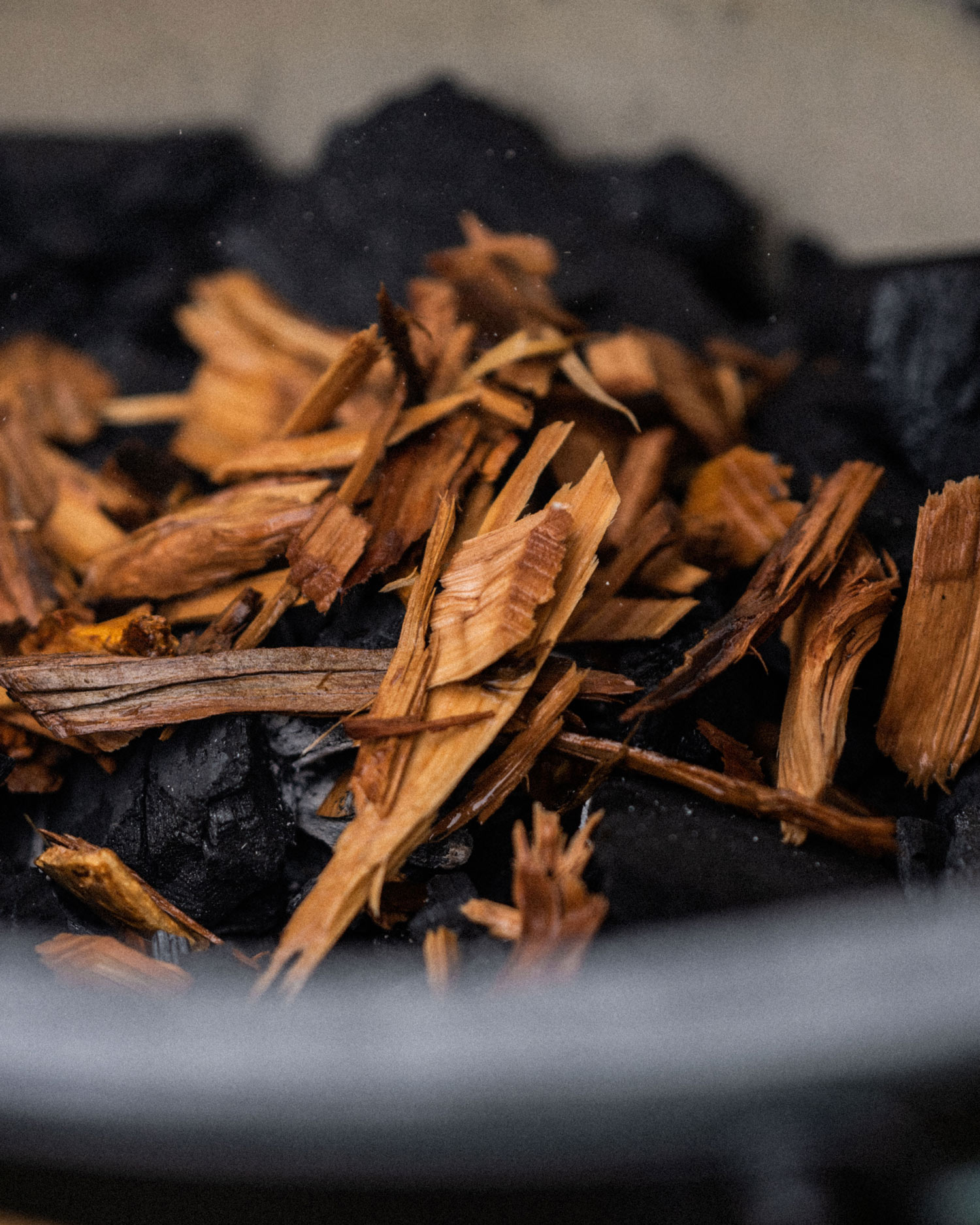 add your pre-soaked smoking chips