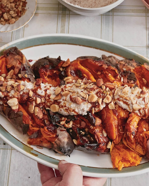 Dirty Sweet potatoes, with almond tahini and smoked almonds | Dirty cooking | Vegetarian Recipes | Honey & Co Chasing smoke cooking over fire around the levant | Big Green Egg