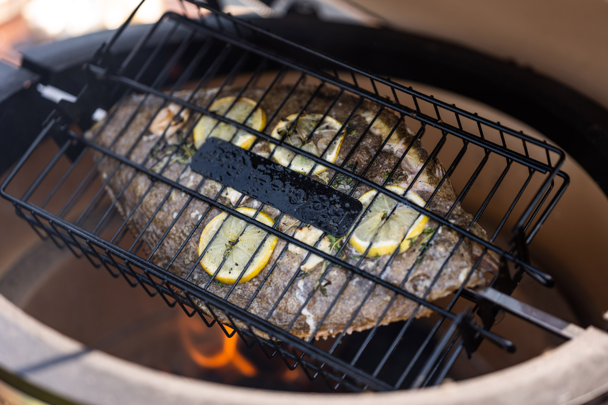 Rotisserie Brill with lemon, garlic and thyme | Rotisserie recipes | Fish | Join the Club | Big Green Egg