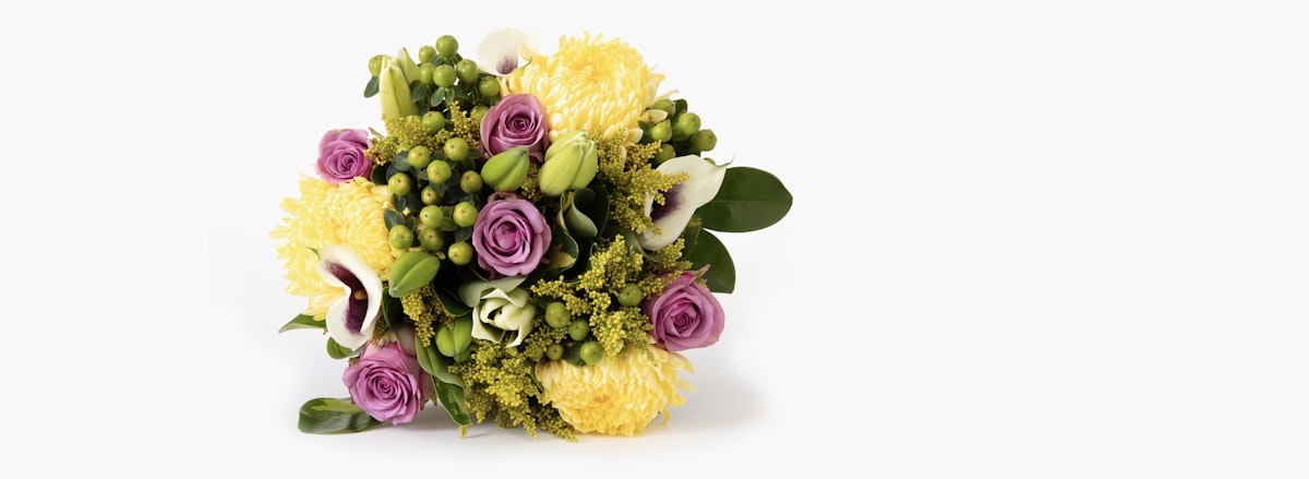 Vibrant floral bouquet featuring yellow chrysanthemums, lavender roses, and green accents.