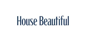 Logo of "House Beautiful" magazine with stylized navy blue letters on a plain white background, representing a well-known home decor and design publication.
