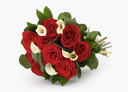 Bouquet of vibrant red roses and white lilies with green leaves tied with a ribbon, displayed against a clean white background, suggesting romance or a special occasion.