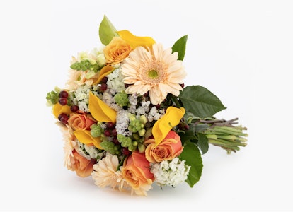 Vibrant bouquet of fresh flowers with orange roses, yellow lilies, and white accents on a clean white background, ideal for special occasions or gifts.