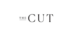 Logo of "The Cut," featuring a minimalist black text design on a white background, with a stylized scissor graphic replacing the letter "U."