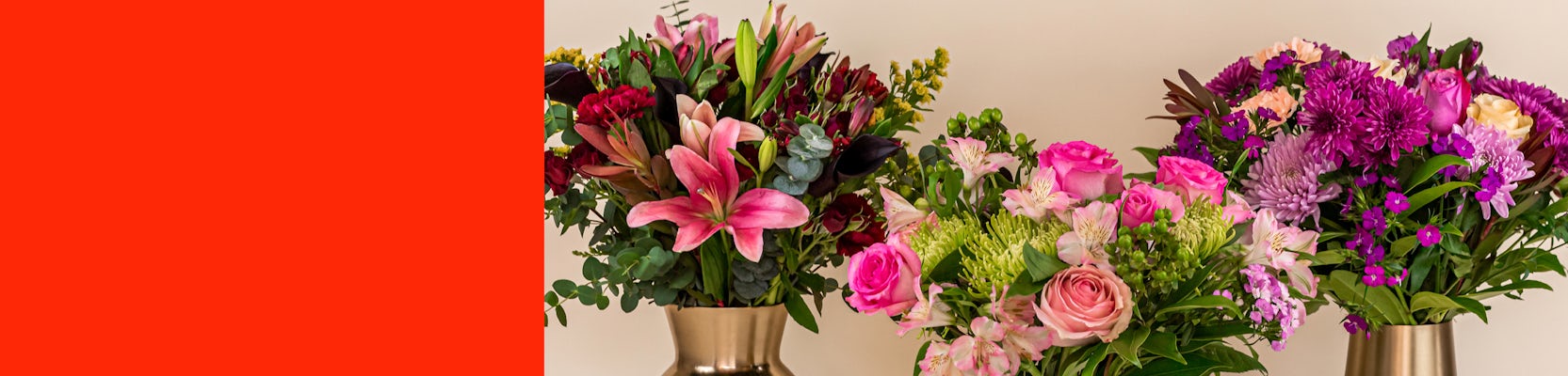 Elegant floral arrangements featuring vibrant lilies, roses, and assorted blooms in stylish vases.