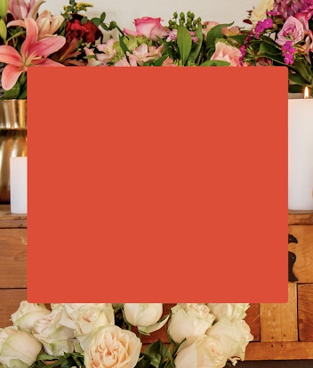 Vibrant floral arrangement featuring assorted roses and lilies, ideal for celebrations.