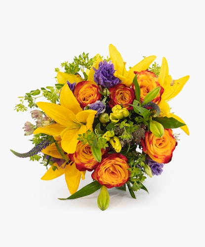 Vibrant floral bouquet featuring yellow lilies, orange roses, and purple blooms.