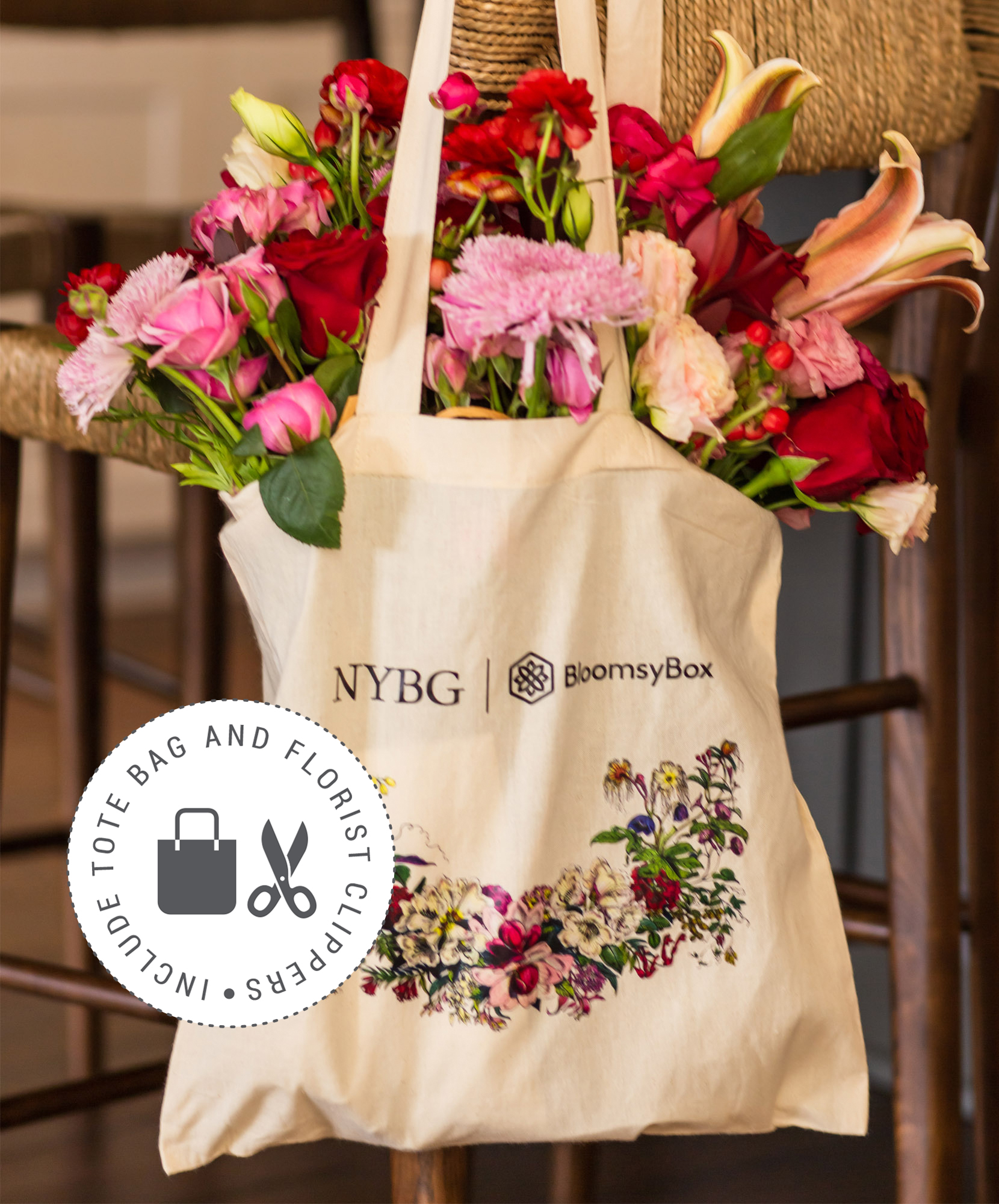 A stylish tote bag filled with vibrant flowers, perfect for gifting or decorations.