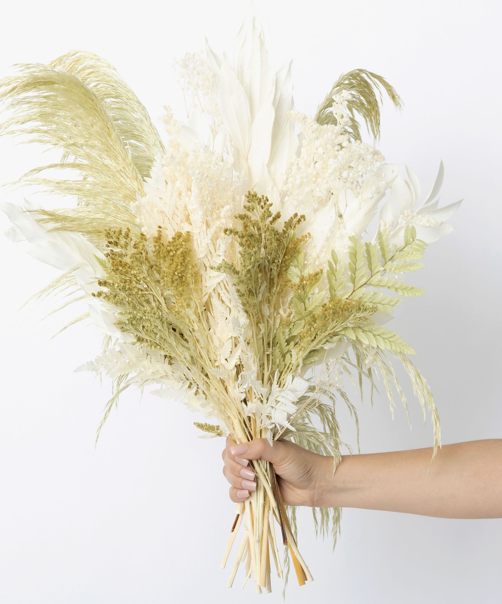 Charming dried floral bouquet featuring soft whites and greens, ideal for home décor.