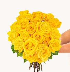 Vibrant bouquet of bright yellow roses held elegantly, perfect for celebrations and gifts.