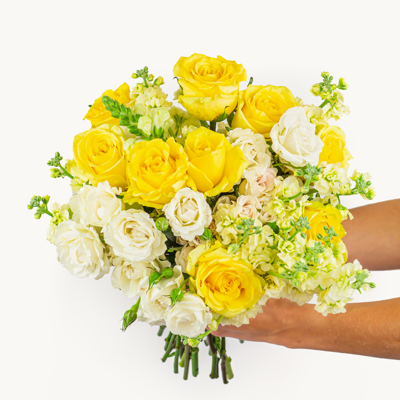 Bright and cheerful bouquet featuring yellow roses and white blooms, perfect for celebrations.