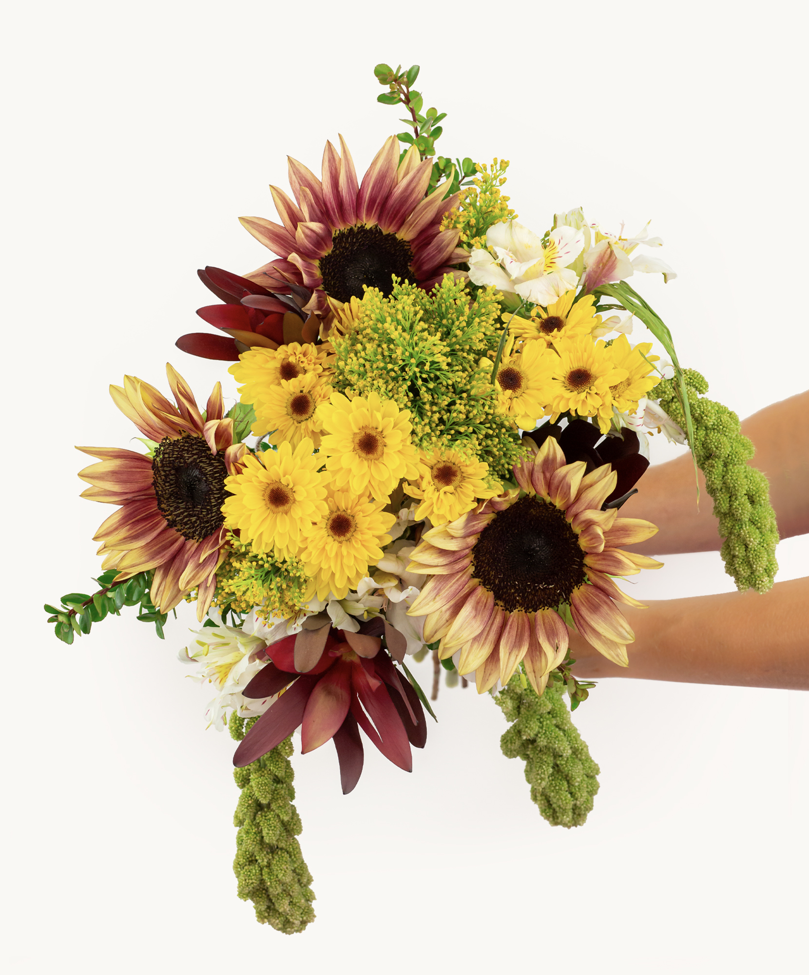 Bright and cheerful bouquet featuring sunflowers, daisies, and lush greenery for vibrant decor.