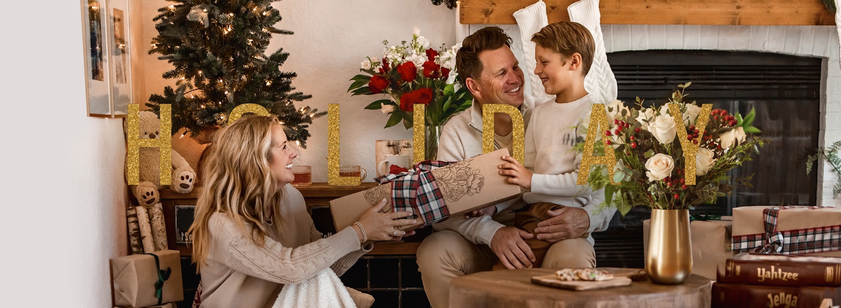 A heartwarming family moment with gift exchange by the cozy fireplace during the holidays.