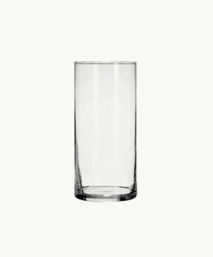 Clear glass vase with a modern design, perfect for floral arrangements and decor.