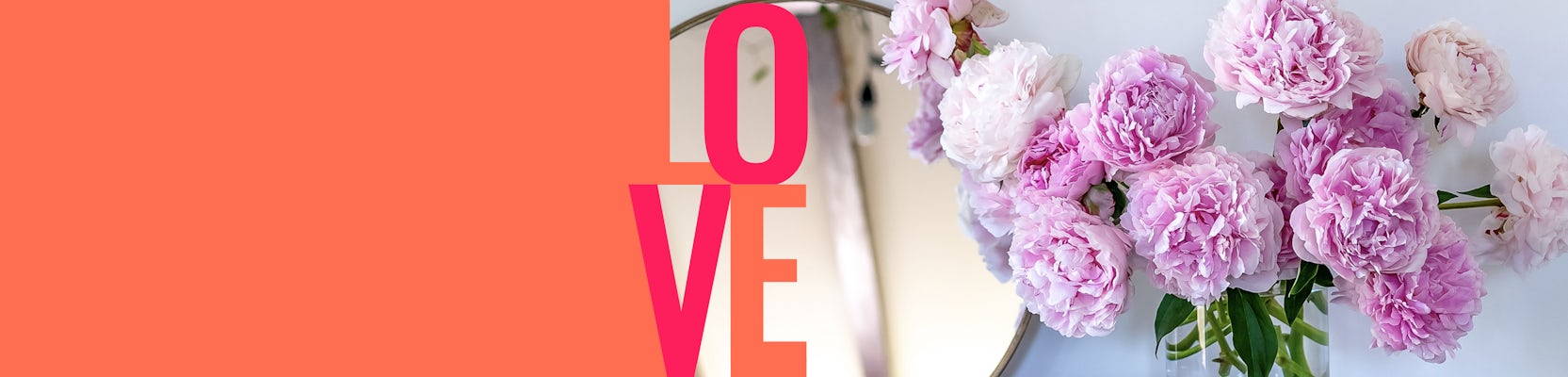 Elegant arrangement of pink peonies beside a reflective surface, celebrating love.