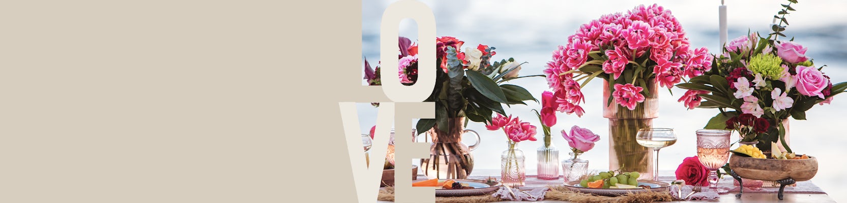 Elegant floral arrangement with pink lilies and roses, ideal for romantic settings.