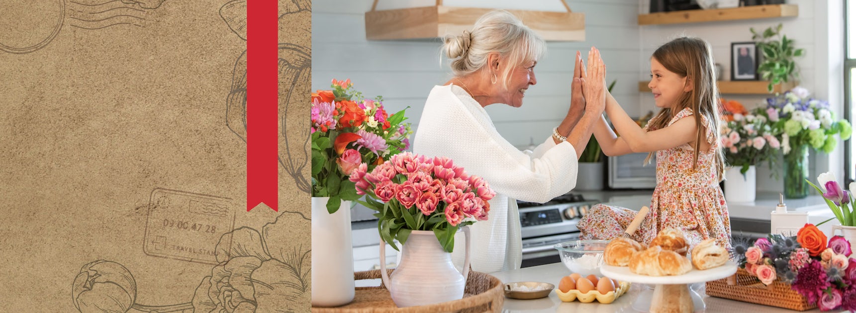 A joyful grandmother and granddaughter playing at home amidst vibrant floral arrangements.
