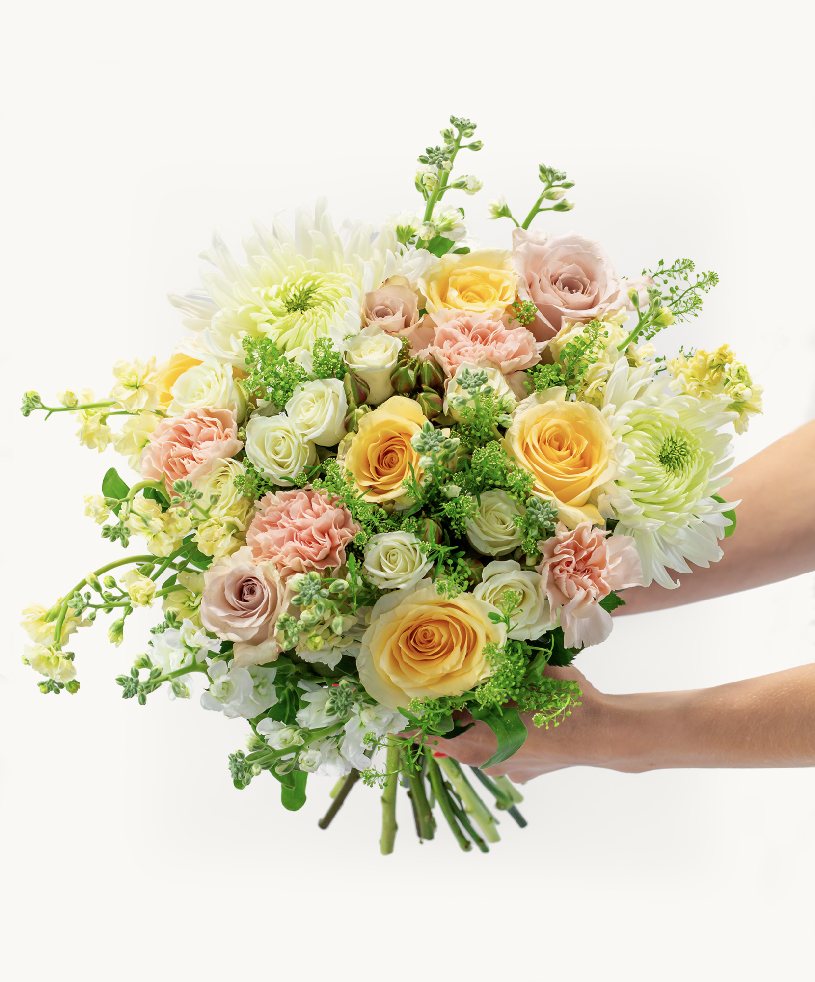 A vibrant bouquet featuring soft peach roses, delicate chrysanthemums, and lush greenery.
