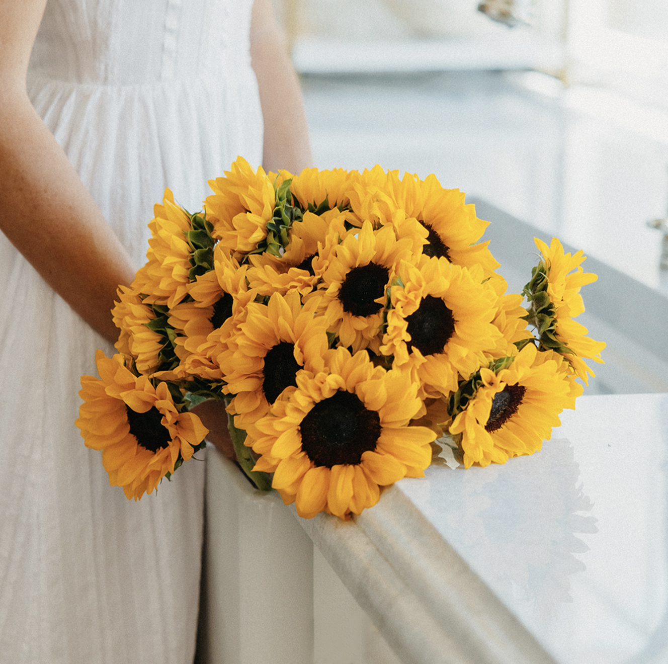 A vibrant bouquet of sunflowers in full bloom, perfect for brightening any space.