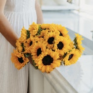 A vibrant bouquet of sunflowers in full bloom, perfect for brightening any space.