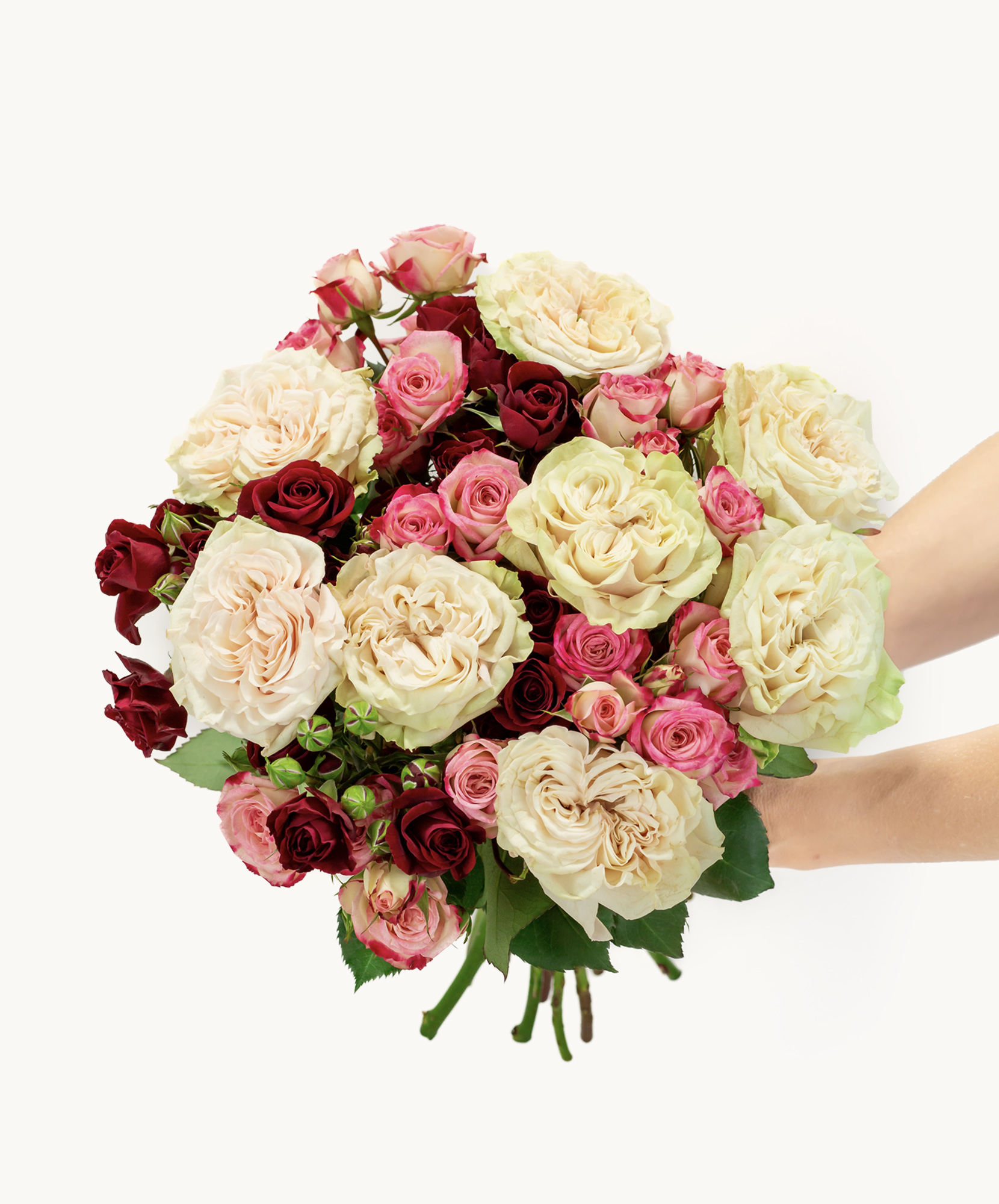 Elegant bouquet featuring a mix of blush, pink, and deep red roses for a romantic touch.