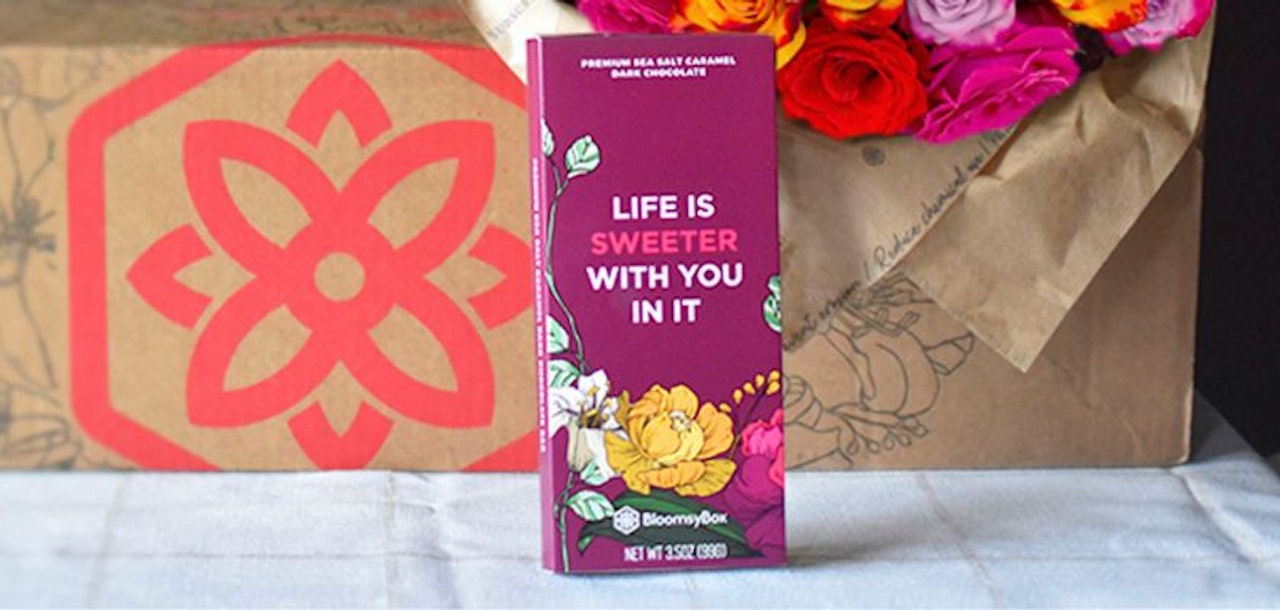 Premium chocolate gift box featuring colorful floral design, perfect for sweet occasions and celebrations.