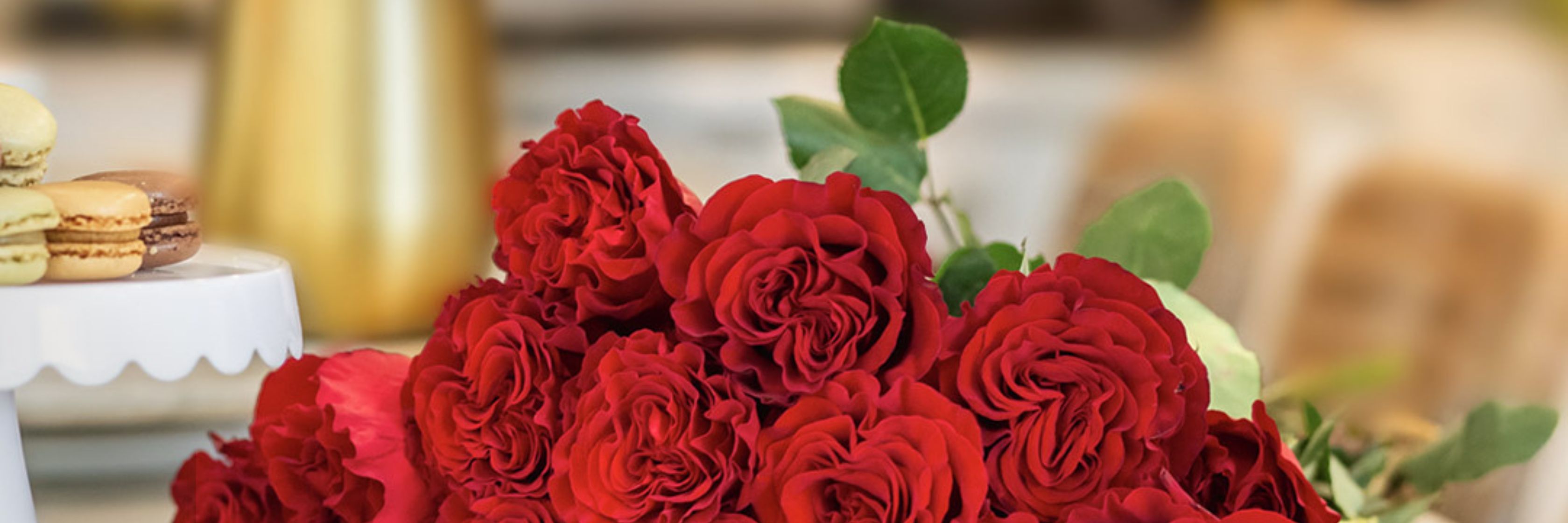 Vibrant bouquet of red roses arranged elegantly, bringing elegance to any celebration or event.