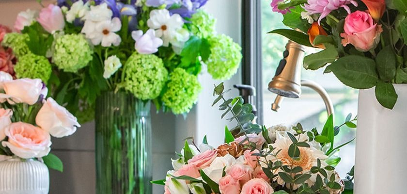 Beautiful flower arrangements featuring roses, peonies, and hydrangeas in various pastel shades.