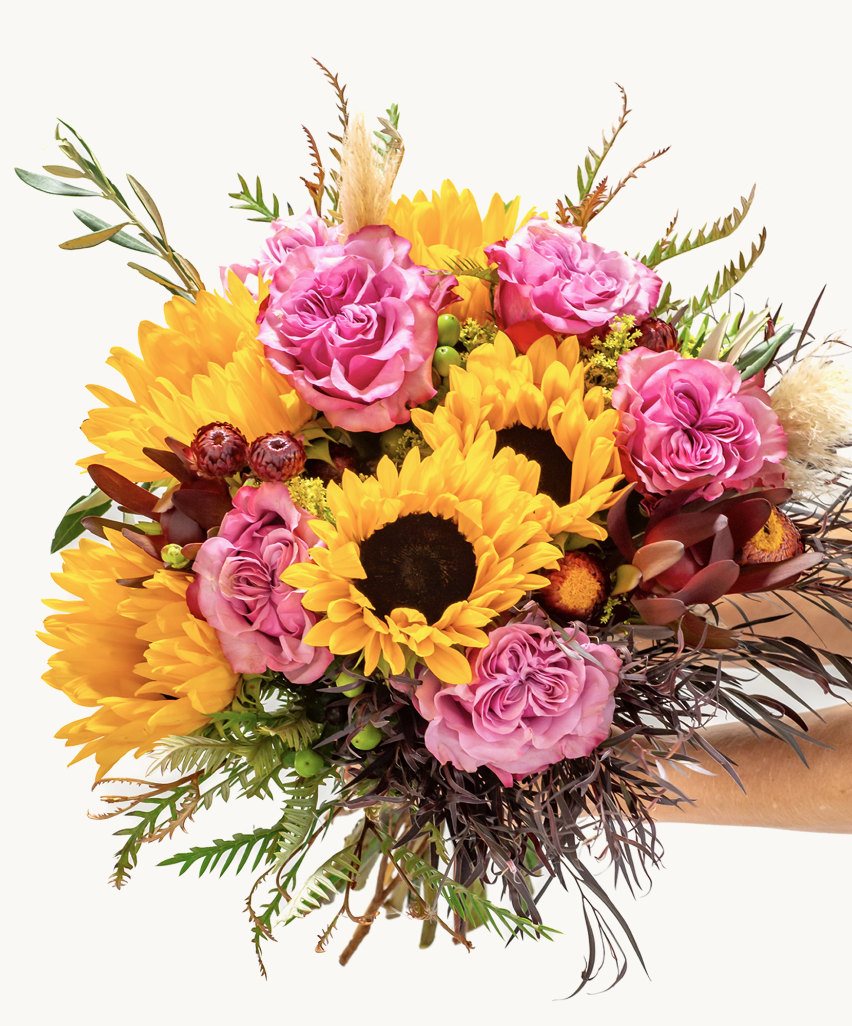 Vibrant bouquet featuring sunflowers and pink roses, perfect for cheerful occasions.