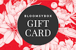 Elegant BloomsyBox gift card design featuring floral patterns on a vibrant red background.